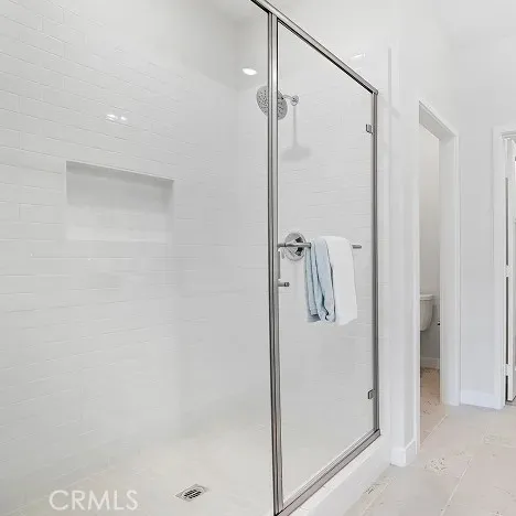 a bedroom with a bed and a cabinets