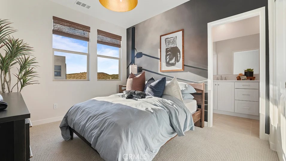 965 Walnut Terrace Montebello, CA 90640 - Photo 20 of 36 a bedroom with a bed and a cabinets