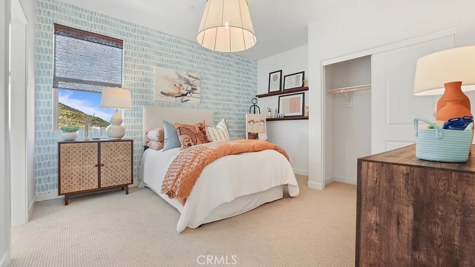 965 Walnut Terrace Montebello, CA 90640 - Photo 24 of 36 a bedroom with a bed and a window