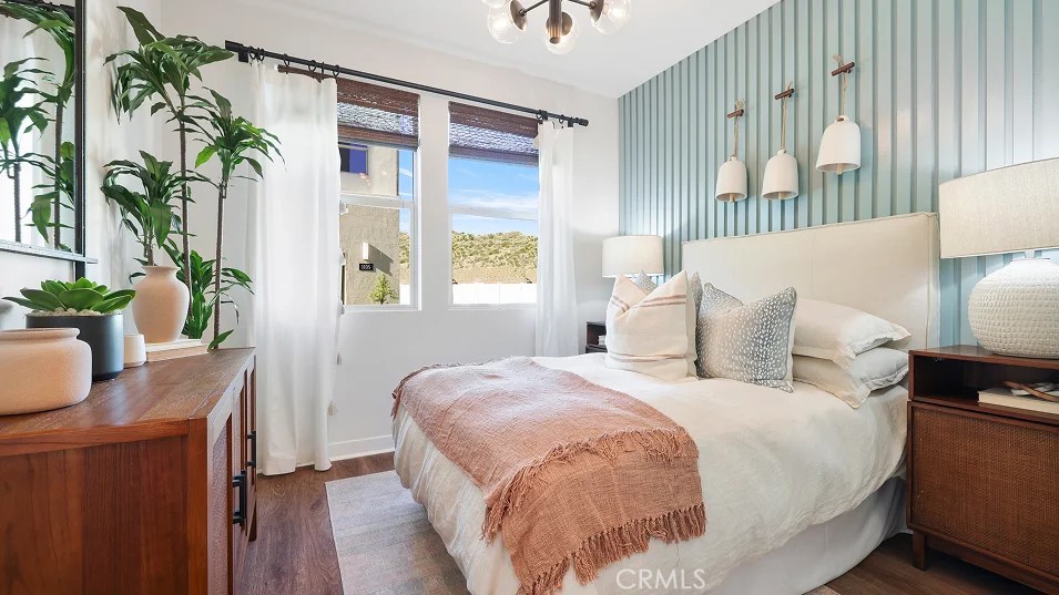 965 Walnut Terrace Montebello, CA 90640 - Photo 26 of 36 a bed sitting in a bedroom next to a window