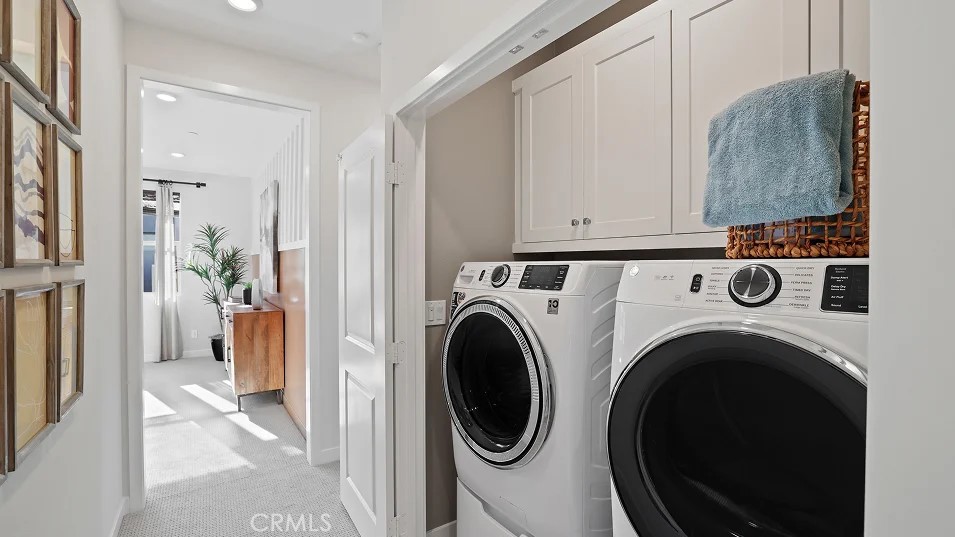 965 Walnut Terrace Montebello, CA 90640 - Photo 29 of 36 a view of a hallway with washer and dryer