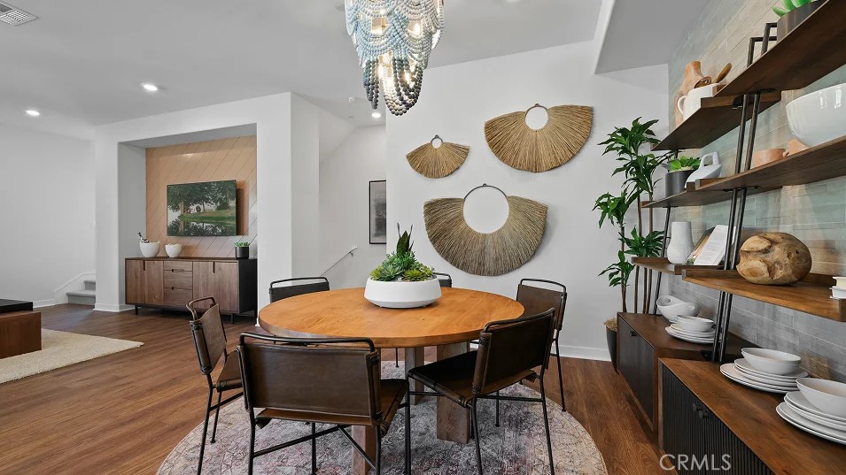 965 Walnut Terrace Montebello, CA 90640 - Photo 9 of 36 a view of a dining room with furniture and wooden floor