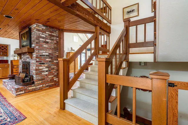a view of staircase with large windows