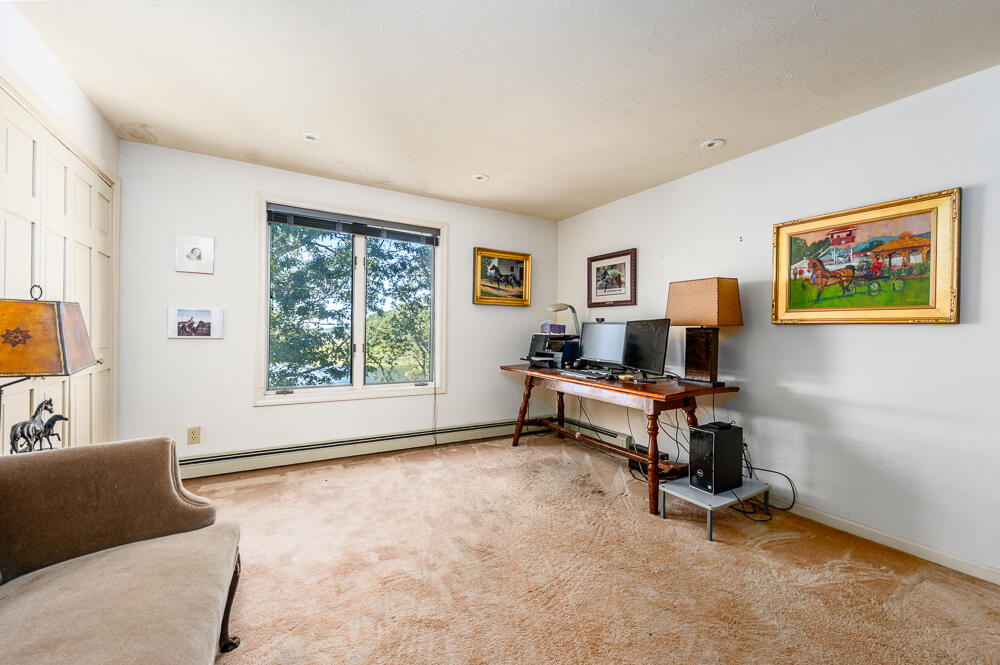 498 Elliott Road Centerville, MA 02632 - Photo 24 of 32 a view of a livingroom with workspace and a window