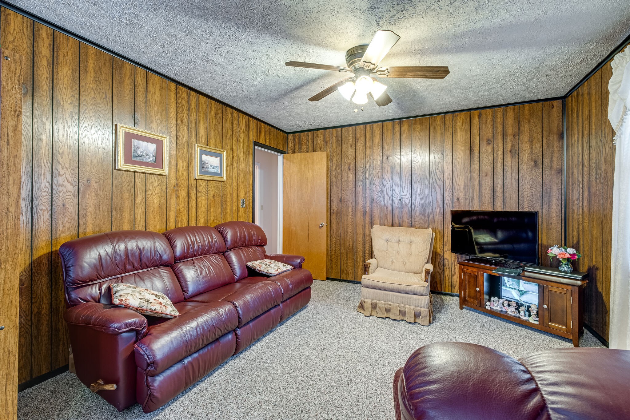 236 Bart Drive Antioch, TN 37013 - Photo 12 of 23 a living room with furniture and a flat screen tv