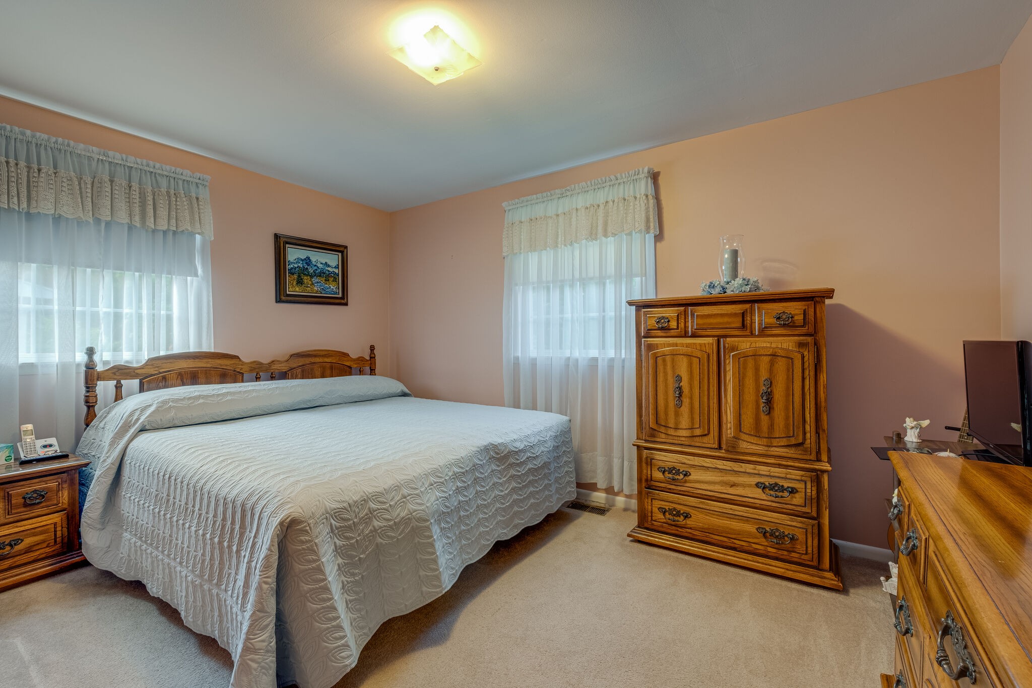 236 Bart Drive Antioch, TN 37013 - Photo 14 of 23 a bedroom with a bed and a tv on wall