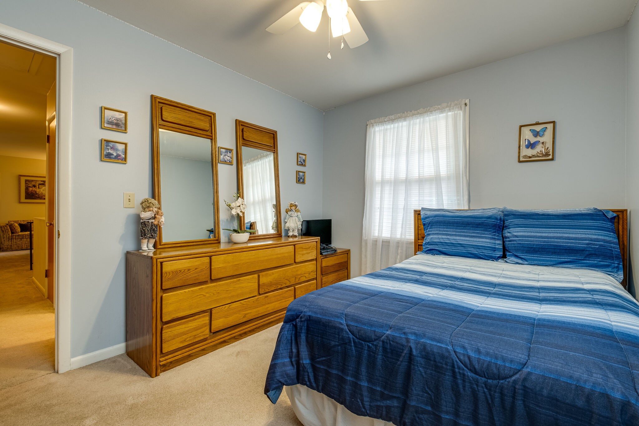 236 Bart Drive Antioch, TN 37013 - Photo 19 of 23 a bedroom with a bed and a chandelier
