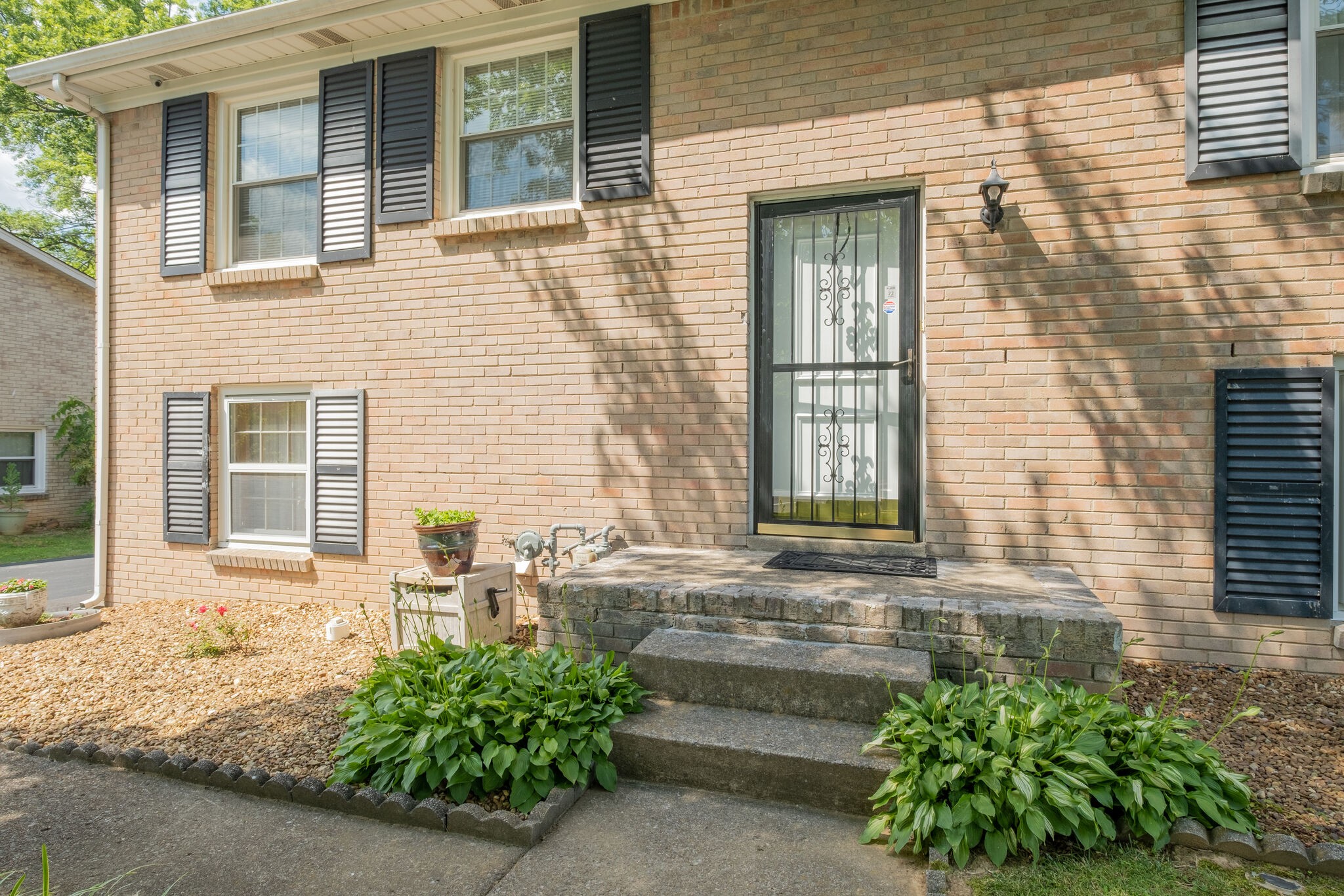 236 Bart Drive Antioch, TN 37013 - Photo 4 of 23 a front view of a house with a yard