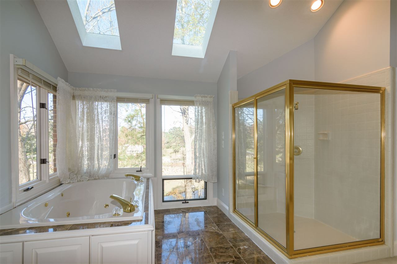 2808 Combe Hill Trail Raleigh, NC 27613 - Photo 20 of 30 Ready to relax after a long day? This master bath has a jetted tub to do just that. Your own escape right at home Master Bath