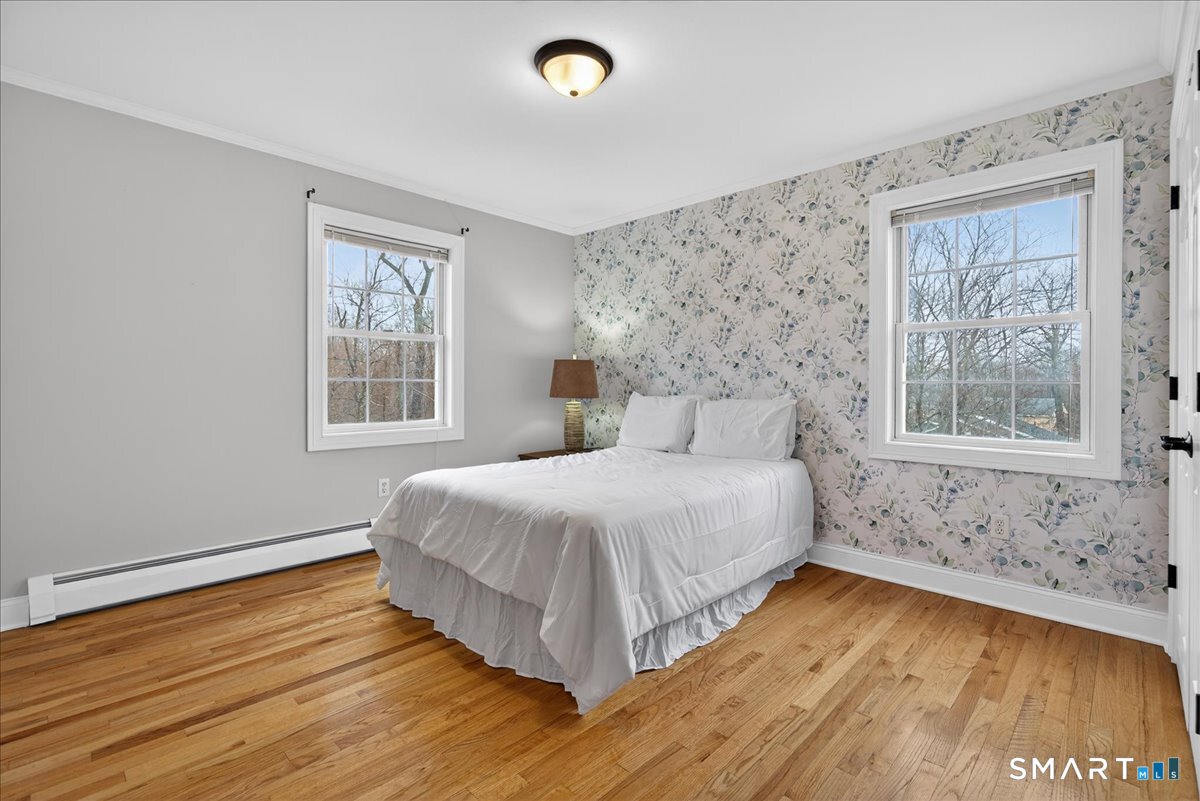 22 Emerald Lane Bethany, CT 06524 - Photo 15 of 28 a bedroom with a bed and a window