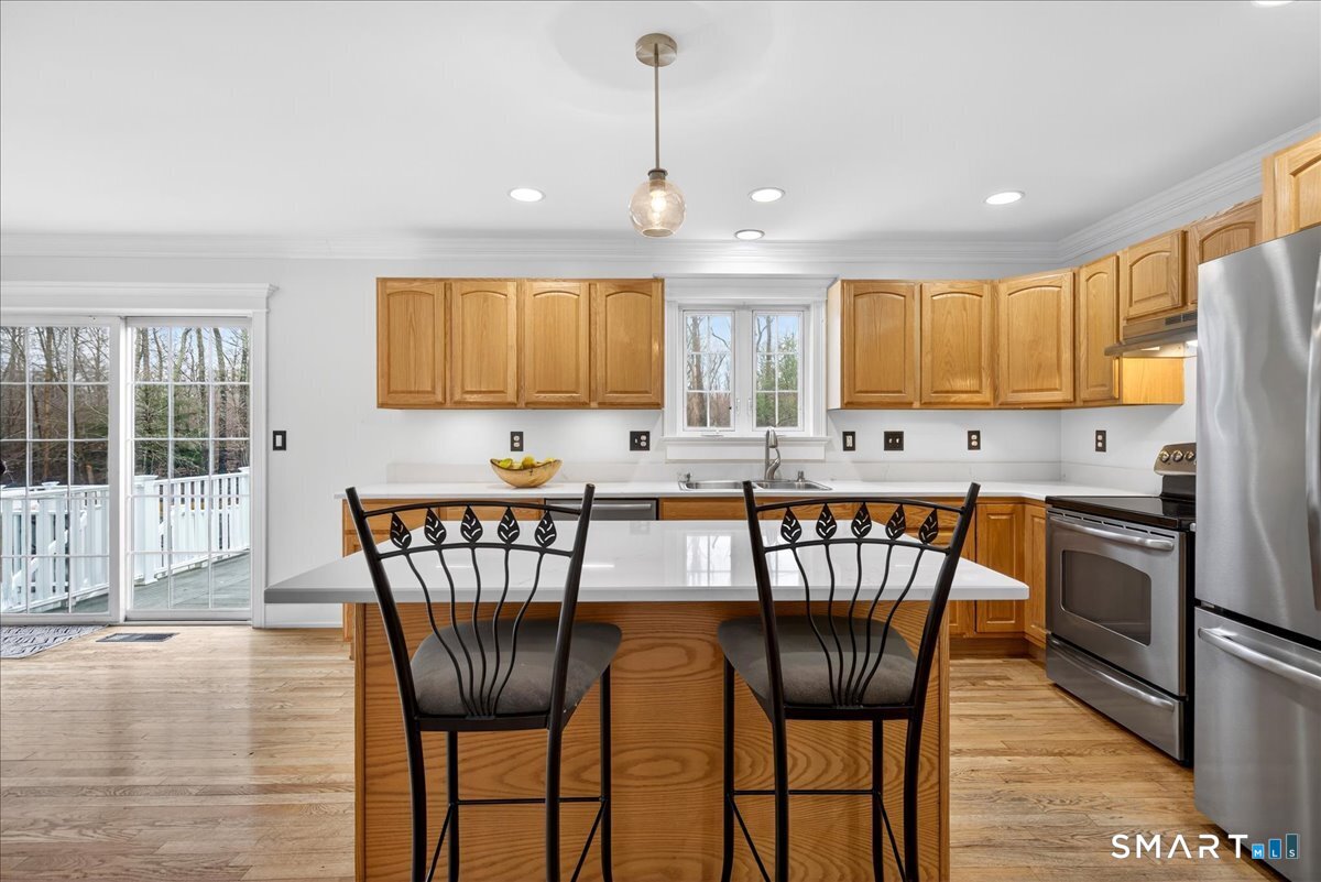 22 Emerald Lane Bethany, CT 06524 - Photo 7 of 28 a view of a dining room with furniture