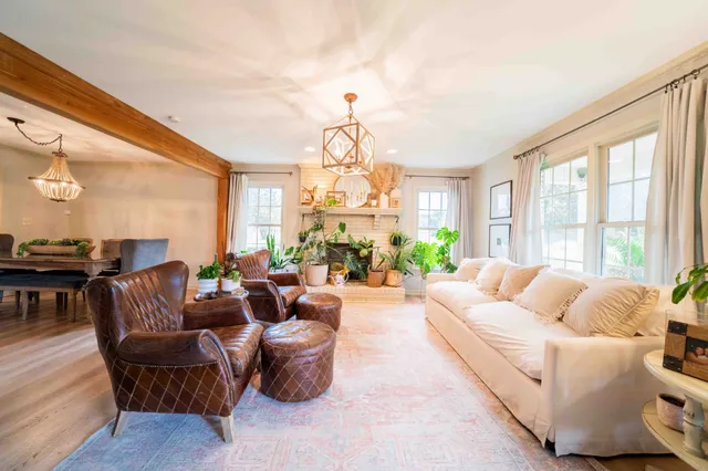 a workspace with furniture window and wooden floor