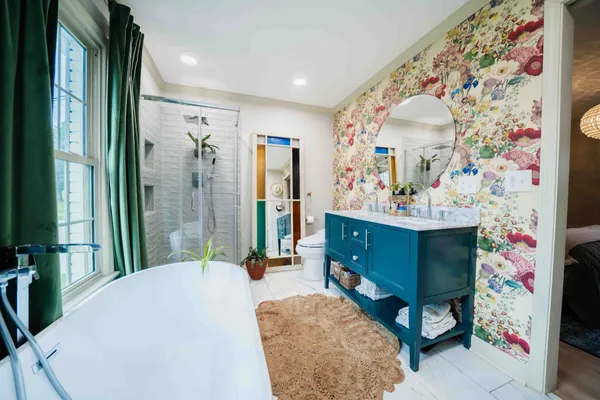 a bedroom with bed and a window