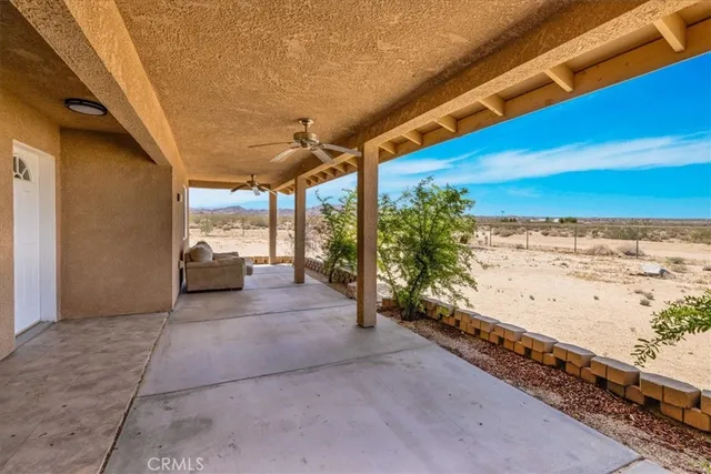 a view of a backyard of the house