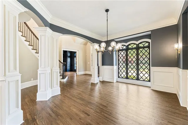 a bathroom with a shower sink and mirror