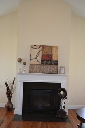 4 Waxen Way Shirley, MA 01464 - Photo 11 of 12 a living room with furniture and a fireplace