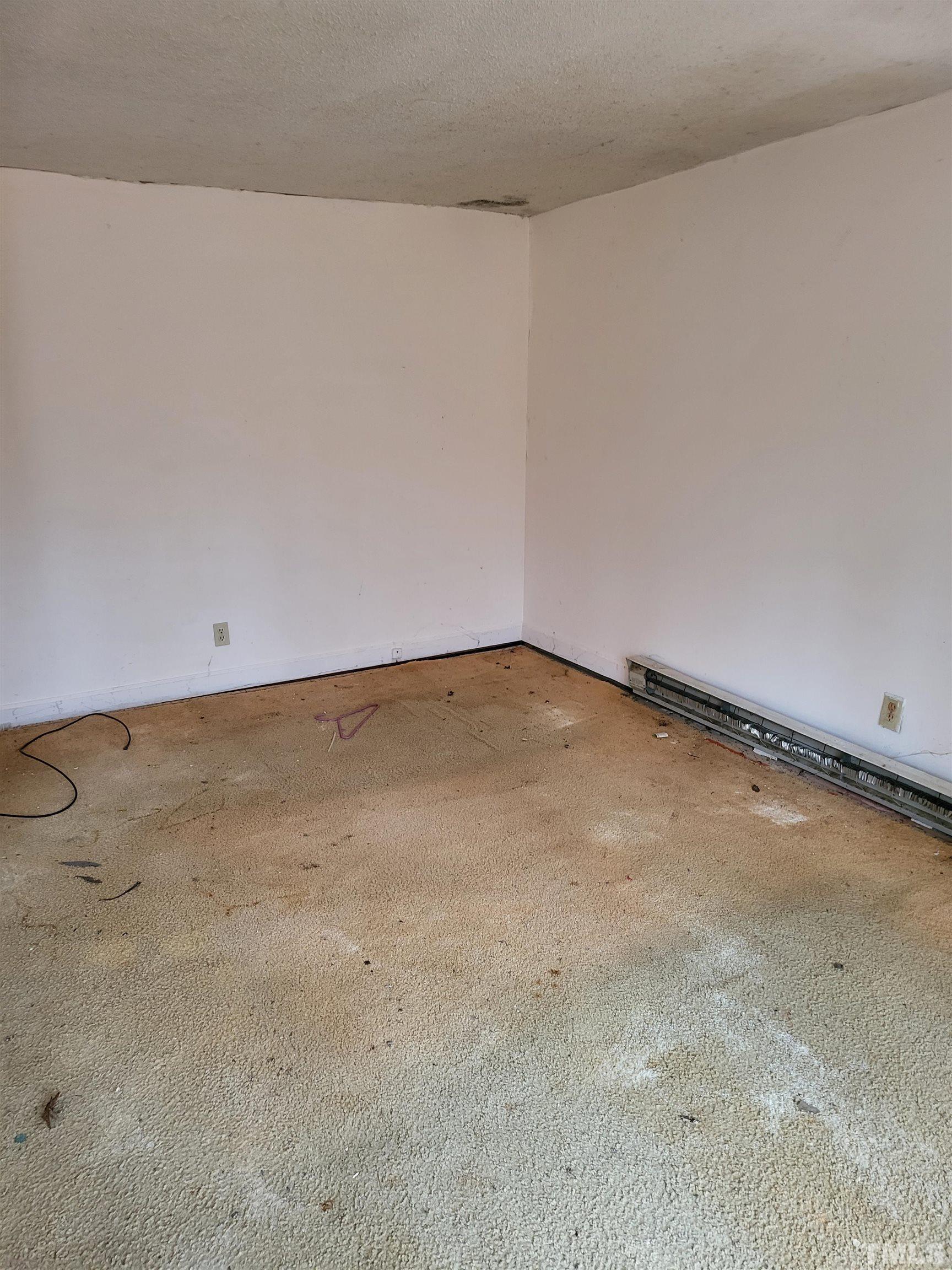 7808 Russell Road Durham, NC 27712 - Photo 7 of 8 a view of a room with an empty space