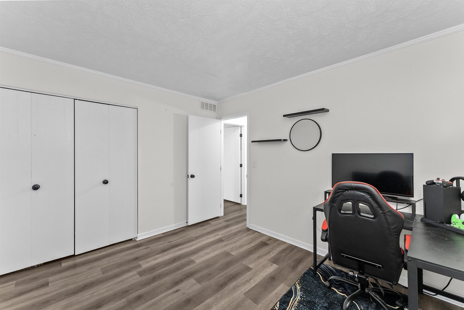 1808 53rd Street, Unit 5 Moline, IL 61265 - Photo 11 of 14 a view of a bedroom with a bed and furniture