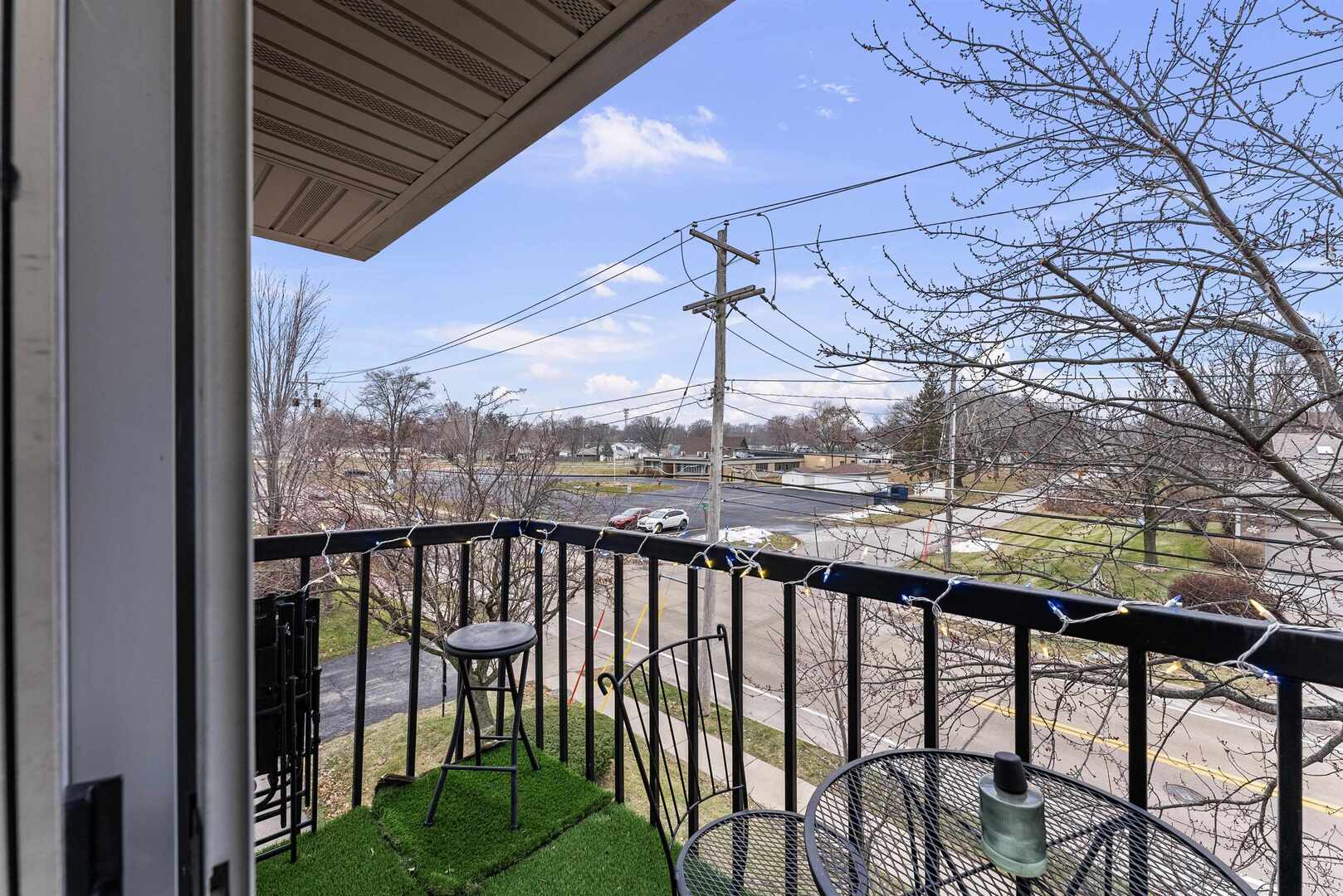 1808 53rd Street, Unit 5 Moline, IL 61265 - Photo 14 of 14 a view of a chairs and table in the balcony