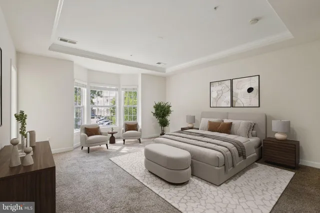 a view of an empty room with glass door