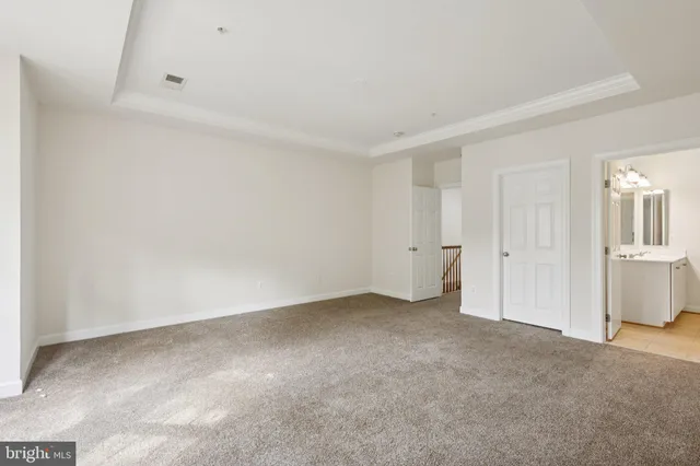 a living room with furniture window and a flat screen tv