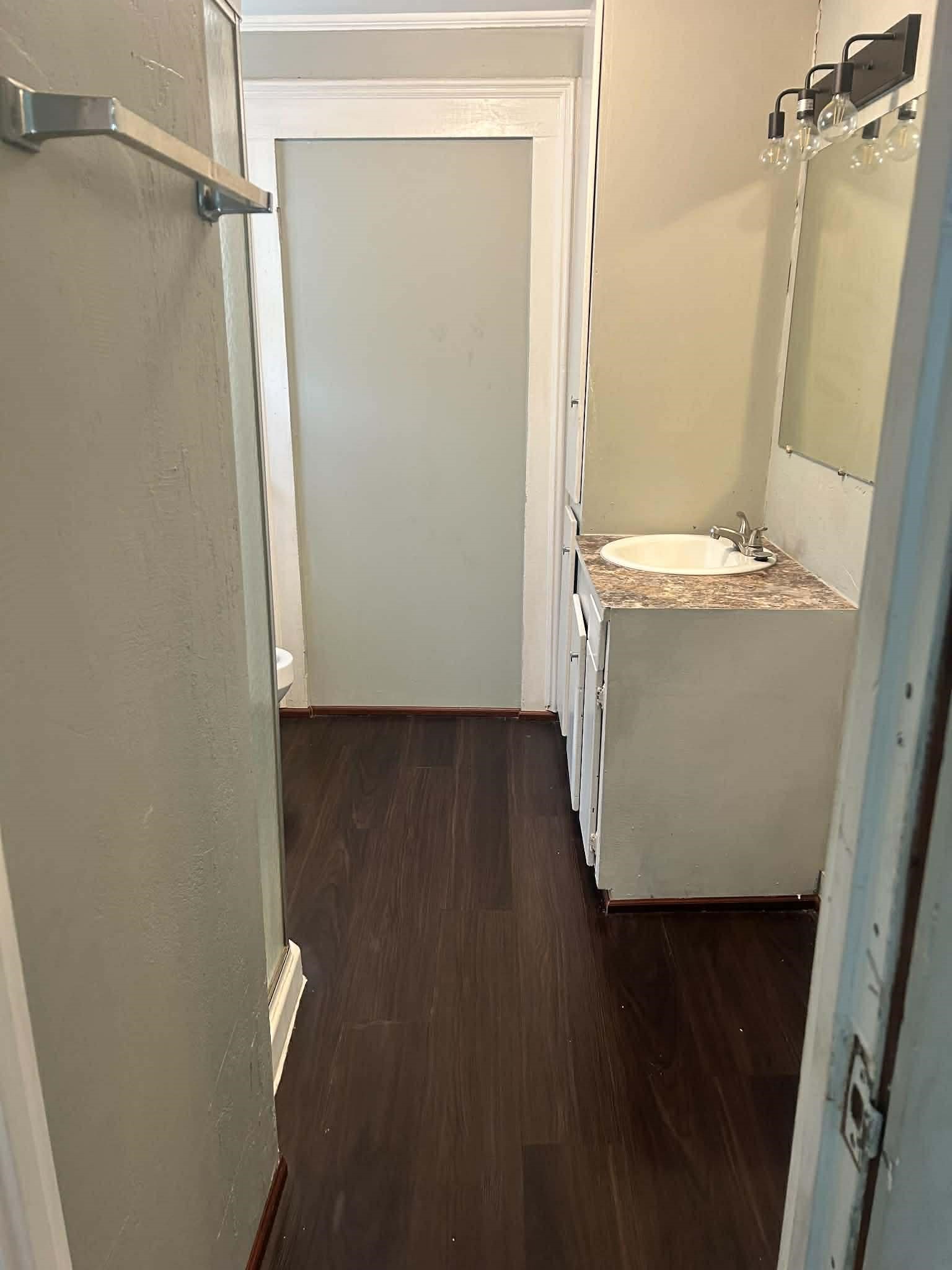 11 Smith Street Shepherd, TX 77371 - Photo 28 of 31 a view of a hallway with wooden floor