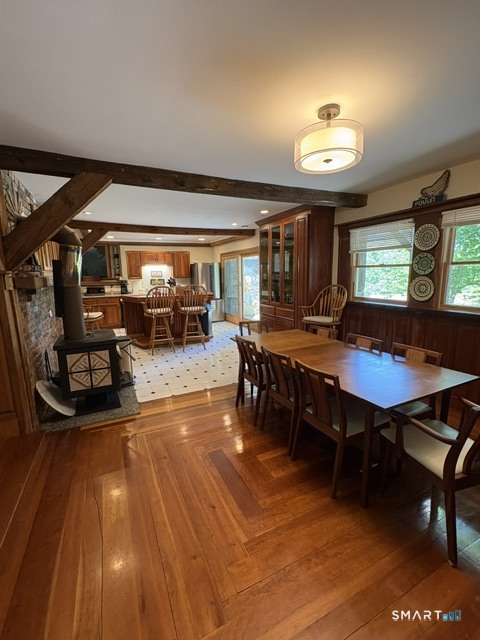40 Looking Glass Hill Road Litchfield, CT 06750 - Photo 9 of 33 a view of a dining room with furniture window and wooden floor