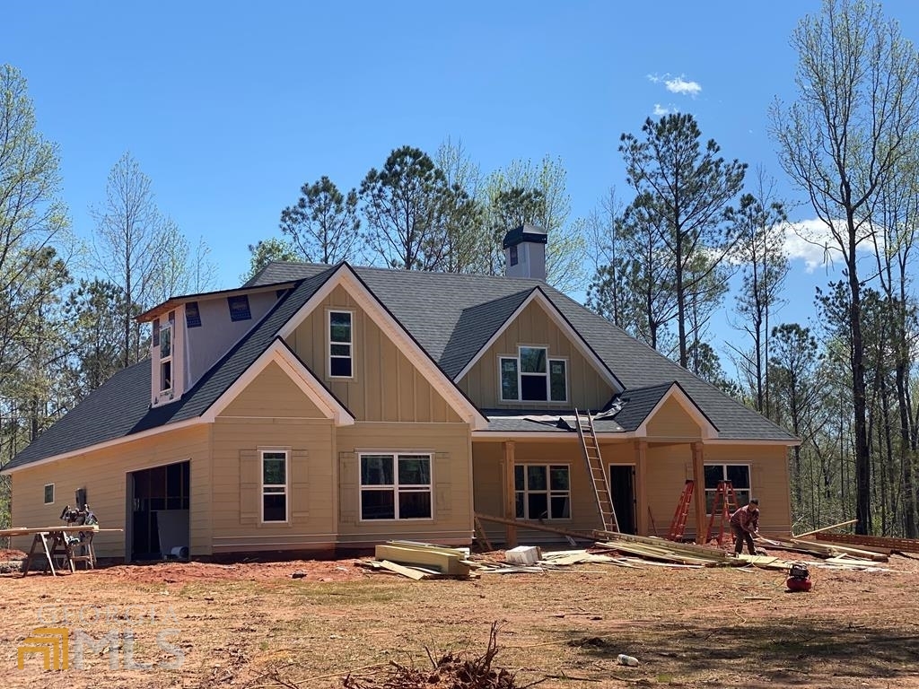 601 Mooyn Road Carrollton, GA 30116 - Photo 1 of 1 a front view of a house with a yard