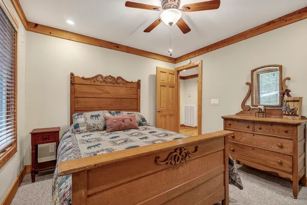 a view of porch with a door and wooden floor