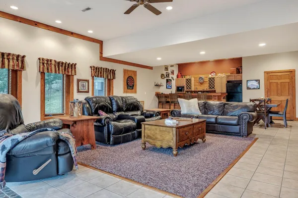 a kitchen with stainless steel appliances a sink and cabinets