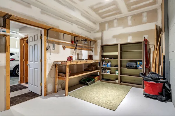 a view of backyard with large trees