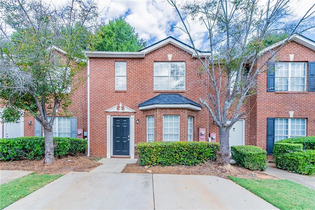 3795 Waldrop Lane Decatur, GA 30034 - Photo 1 of 1 front view of a brick house with a yard