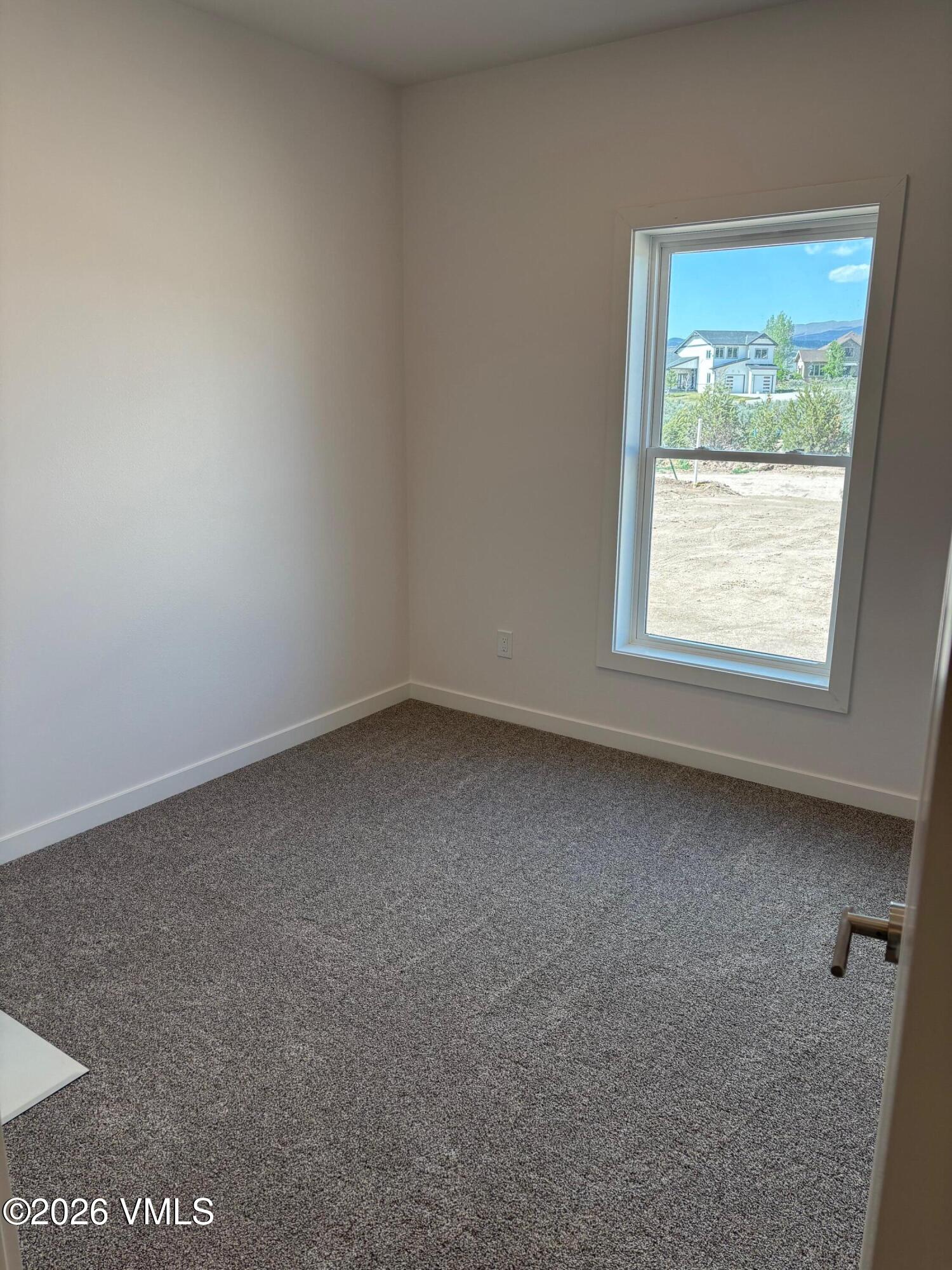 525 Blackhawk Road Gypsum, CO 81637 - Photo 23 of 23 an empty room with a window