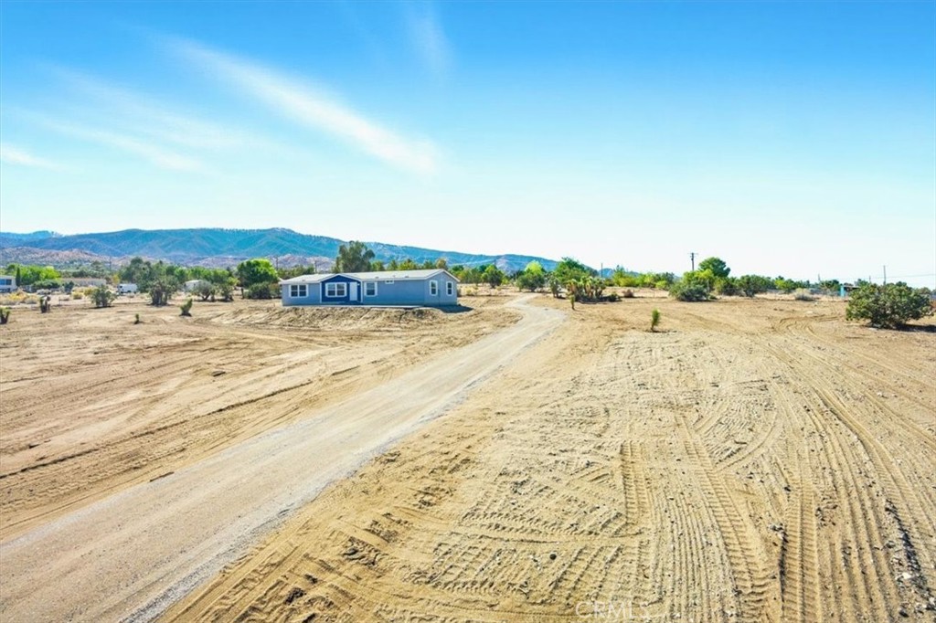 13358 Buttonwood Street Phelan, CA 92371 - Photo 4 of 33 a view of an ocean beach