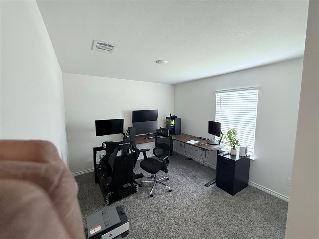 1602 Maple Ridge Drive Princeton, TX 75407 - Photo 10 of 13 Carpeted flooring, white painted walls, and a window with blinds