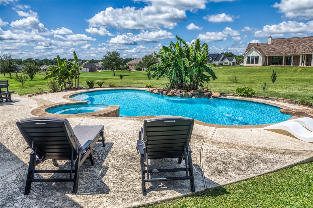 586 Ruby Drive Bellville, TX 77418 - Photo 31 of 50 a view of outdoor space yard swimming pool and patio