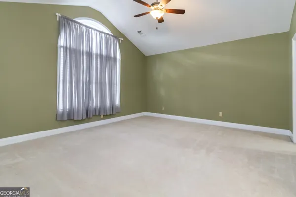 a bathroom with a sink vanity and a mirror