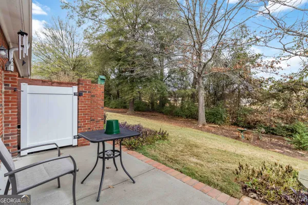 an aerial view of houses with outdoor space