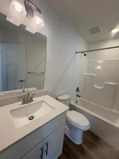 a view of empty room with windows