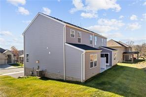 1253 Bedford Road, Unit 2084B Irwin, PA 15642 - Photo 10 of 10 a view of a house with a yard