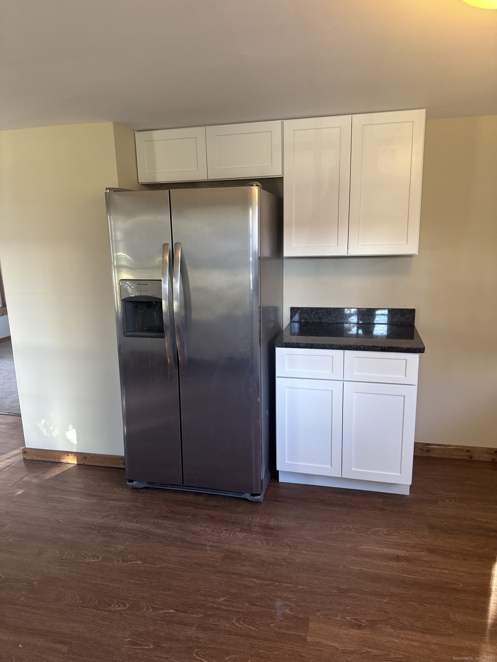 1896 Spruce Street West Suffield, CT 06093 - Photo 6 of 11 a kitchen with stainless steel appliances a refrigerator sink and cabinets