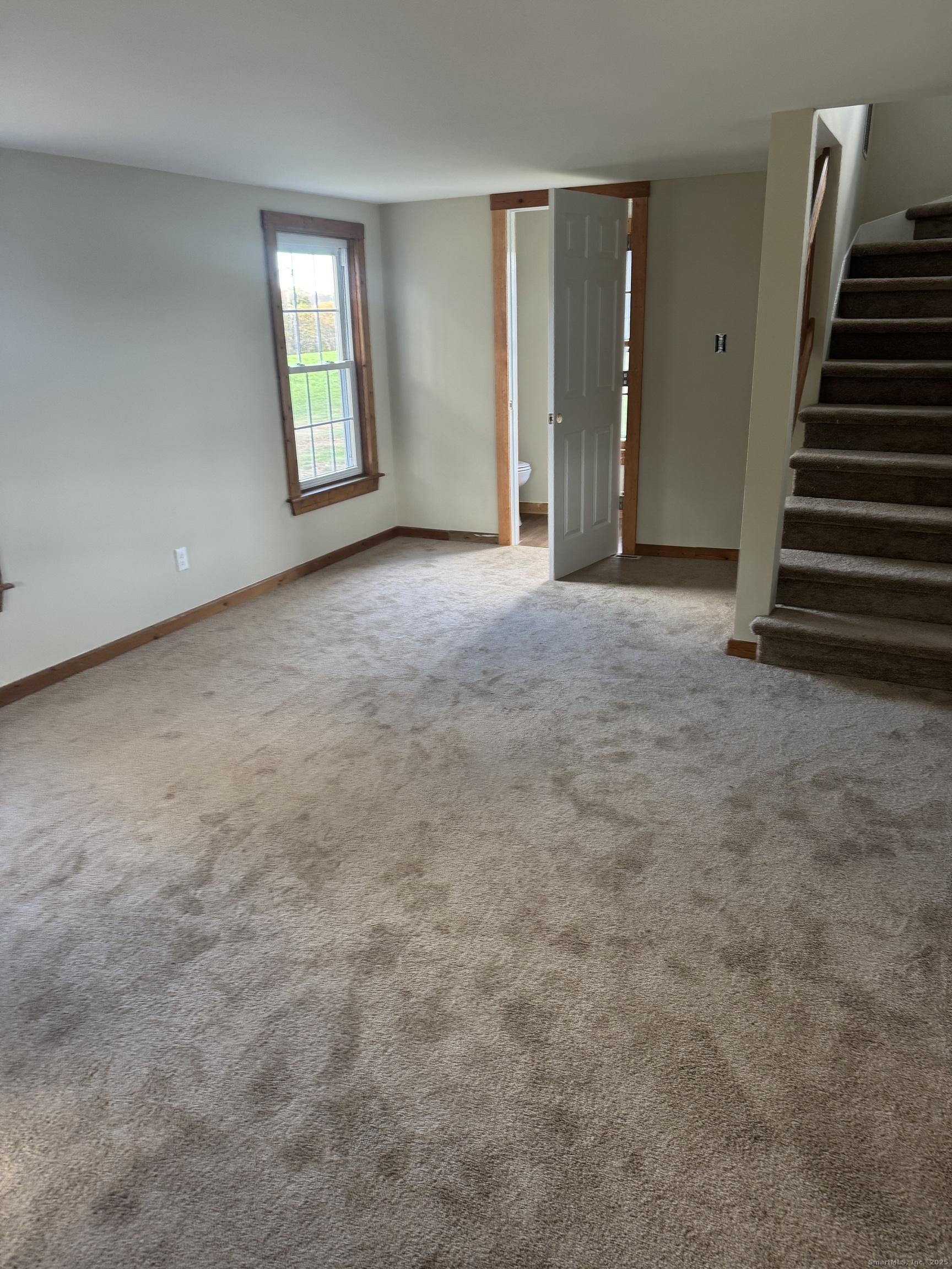 1896 Spruce Street West Suffield, CT 06093 - Photo 9 of 11 an empty room with windows