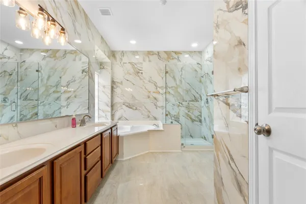 a bathroom with a sink and a bathtub