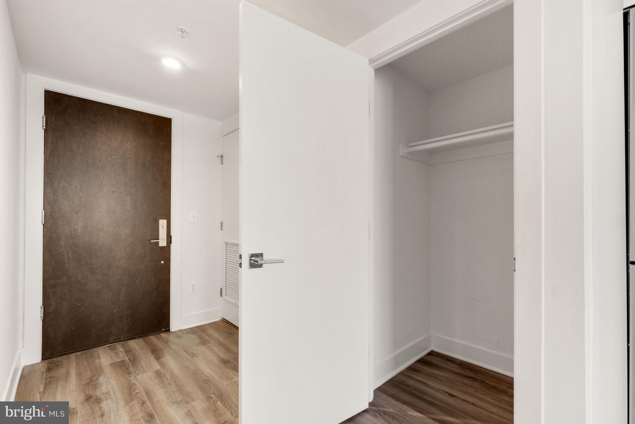 1311 13th Street Northwest, Unit 409 Washington, DC 20005 - Photo 18 of 25 a view of a room with wooden floor