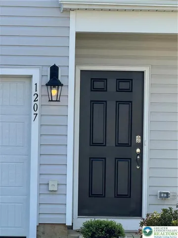 a front view of a house with entryway
