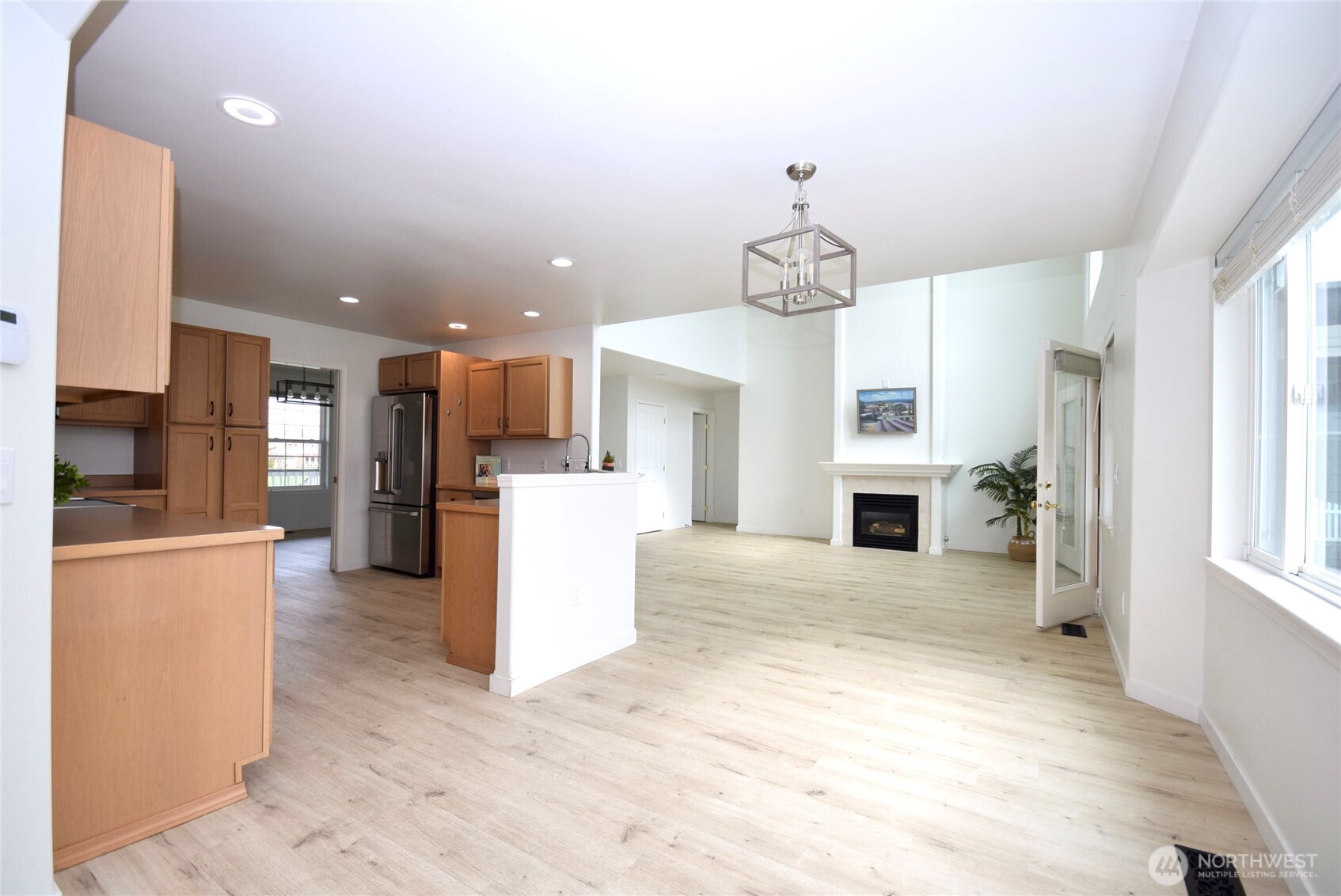 71 John Carl Road Sequim, WA 98382 - Photo 10 of 37 a view of a kitchen with furniture and a ceiling fan
