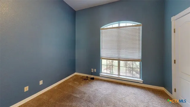 a view of a room with windows