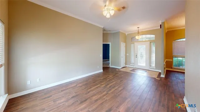 a view of a chandelier in hallway
