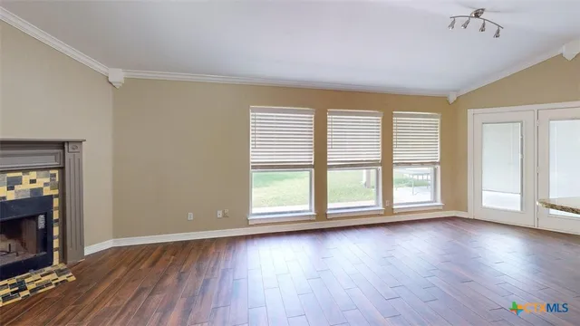 a living room with wooden floor