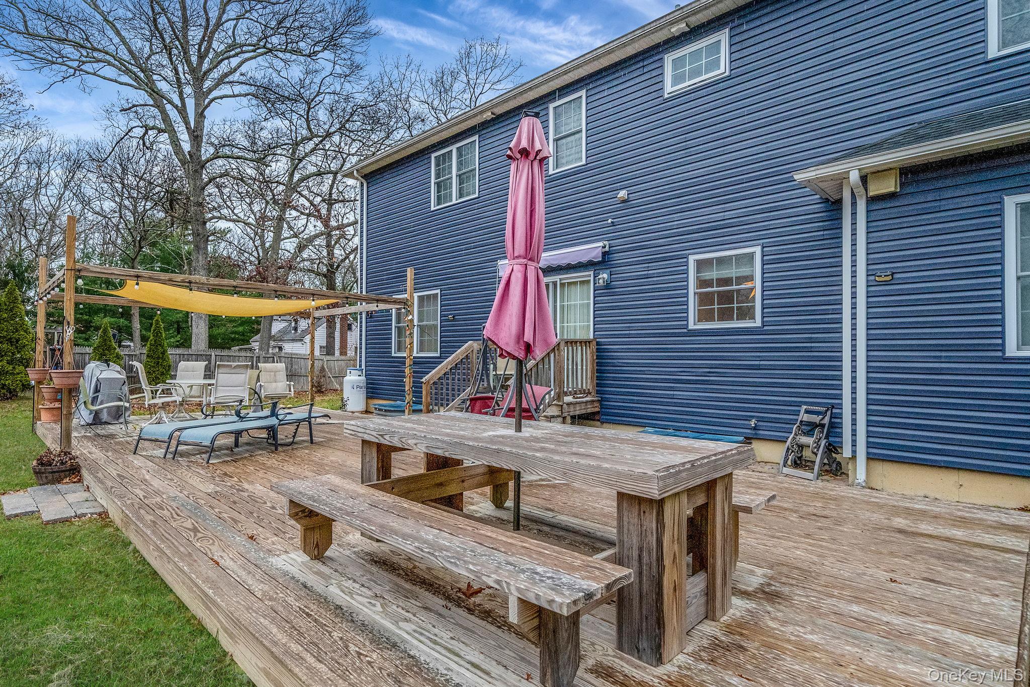 152 Wood Road Centereach, NY 11720 - Photo 29 of 35 a view of house with a patio